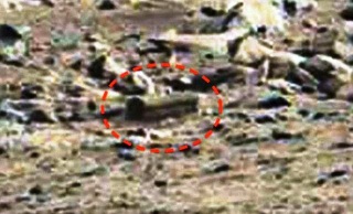 Illustration for article titled Do These NASA Photos Reveal a Coffin on Mars?!